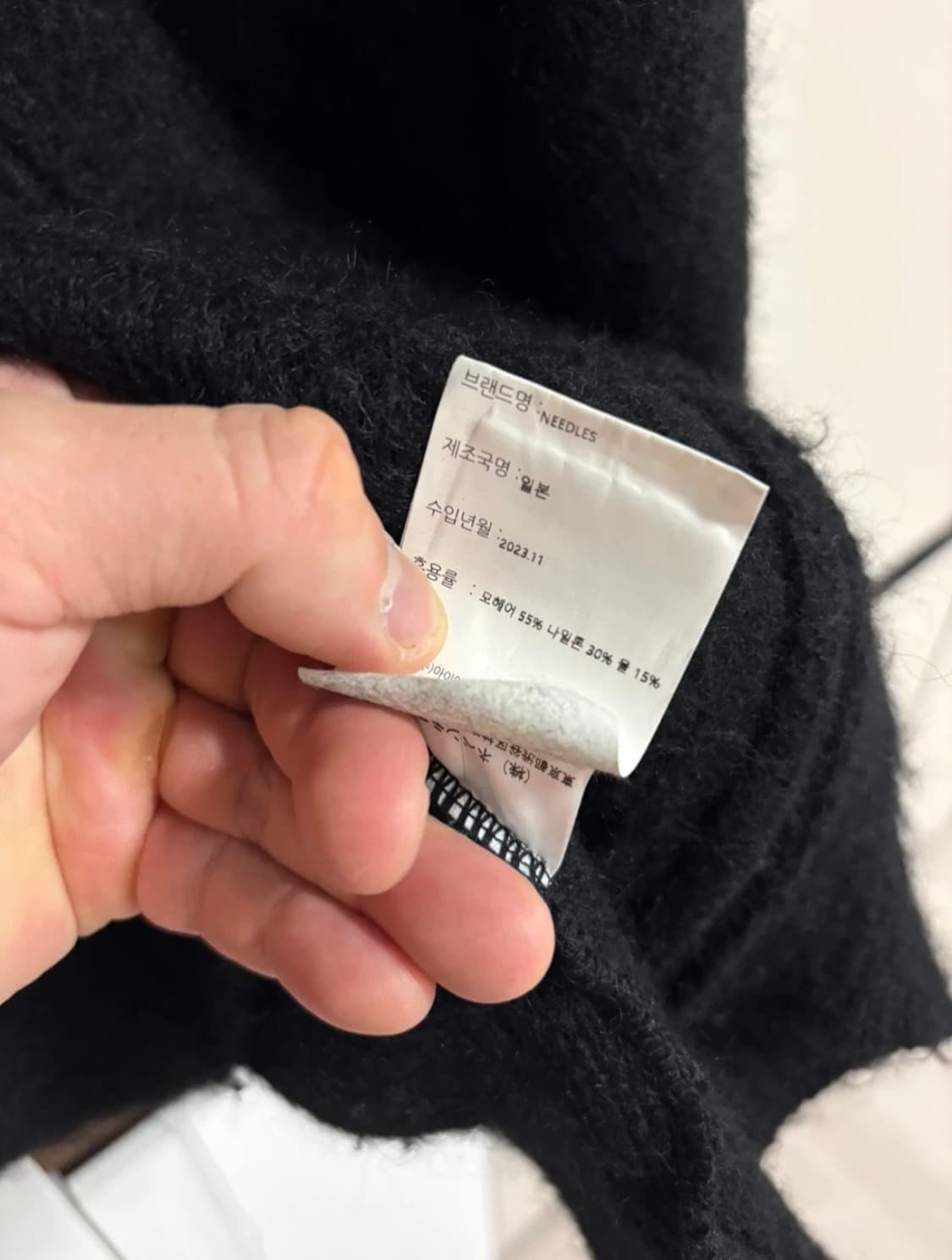 니들스 니트 집업 상품이미지3