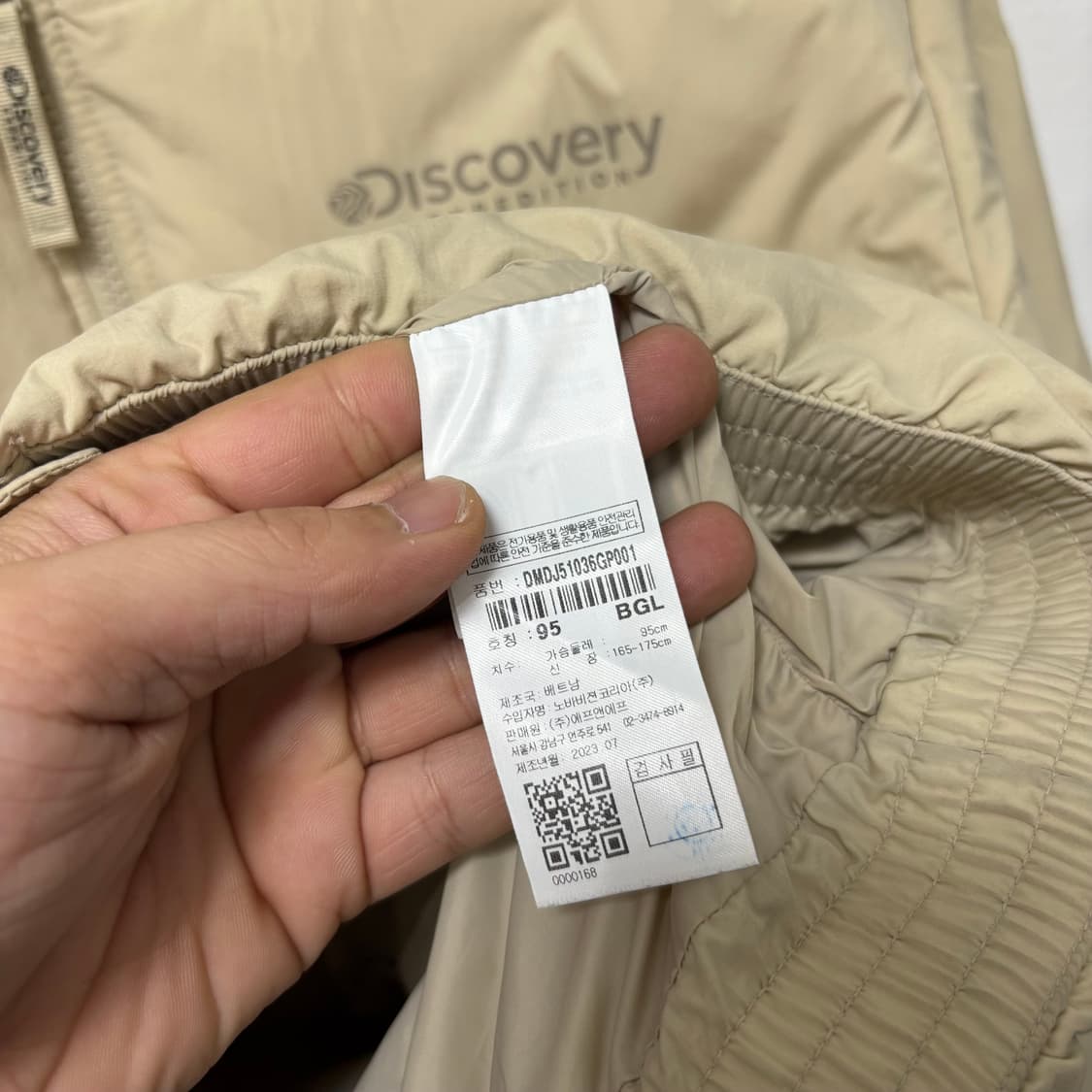 디스커버리 베이지 픽토르U 경량 패딩 상품이미지5