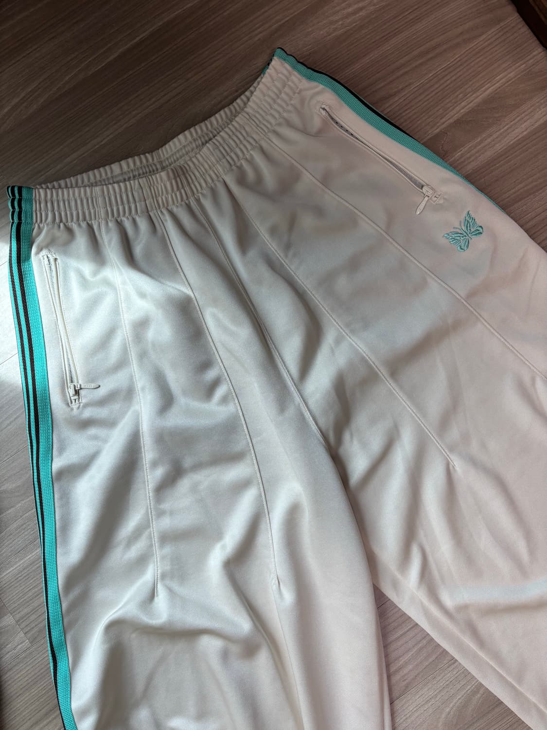 니들스 스튜디오스 별주 hd 트랙팬츠 상품이미지1