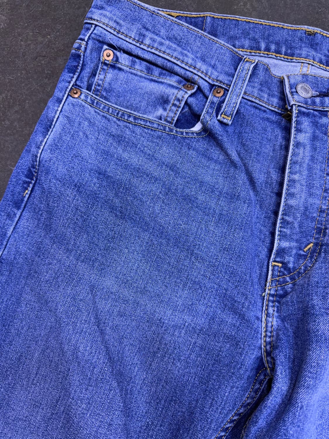 리바이스 502 테이퍼드핏 기능성 코튼 빈티지 중청 데님팬츠 32 상품이미지4