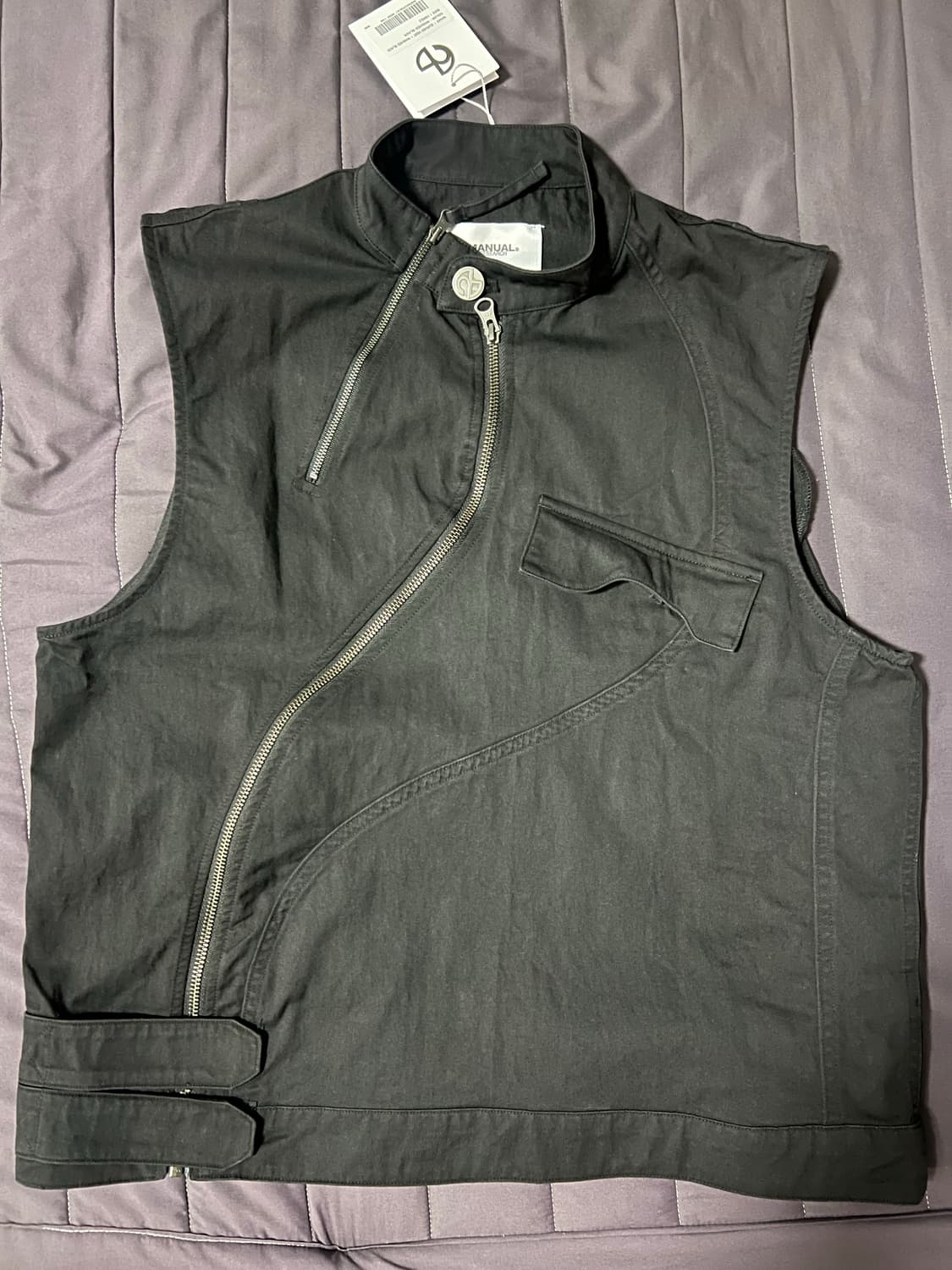 노매뉴얼 커브드 베스트 워시드 블랙 L 상품이미지1