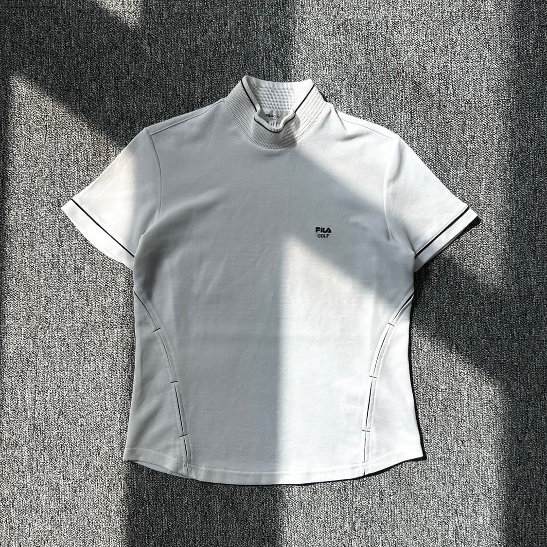 휠라 골프 하이넥 반팔티셔츠  상품이미지1