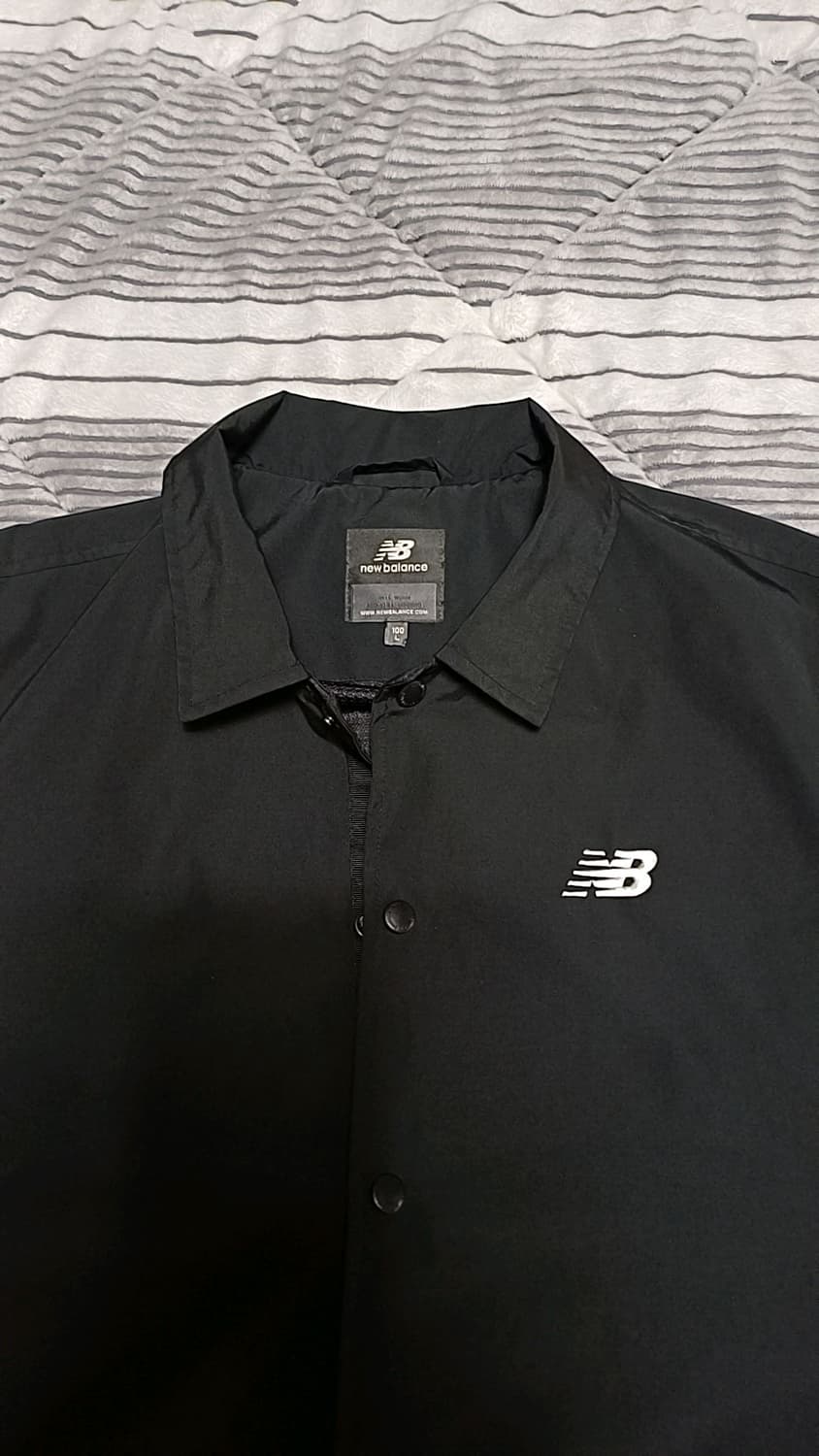 뉴발란스 반팔바람막이 100 가슴58 기장75 상품이미지3