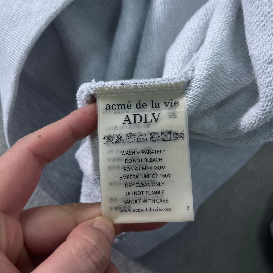 105 아크메드라비 빅로고 오트밀 후드티 상품이미지10