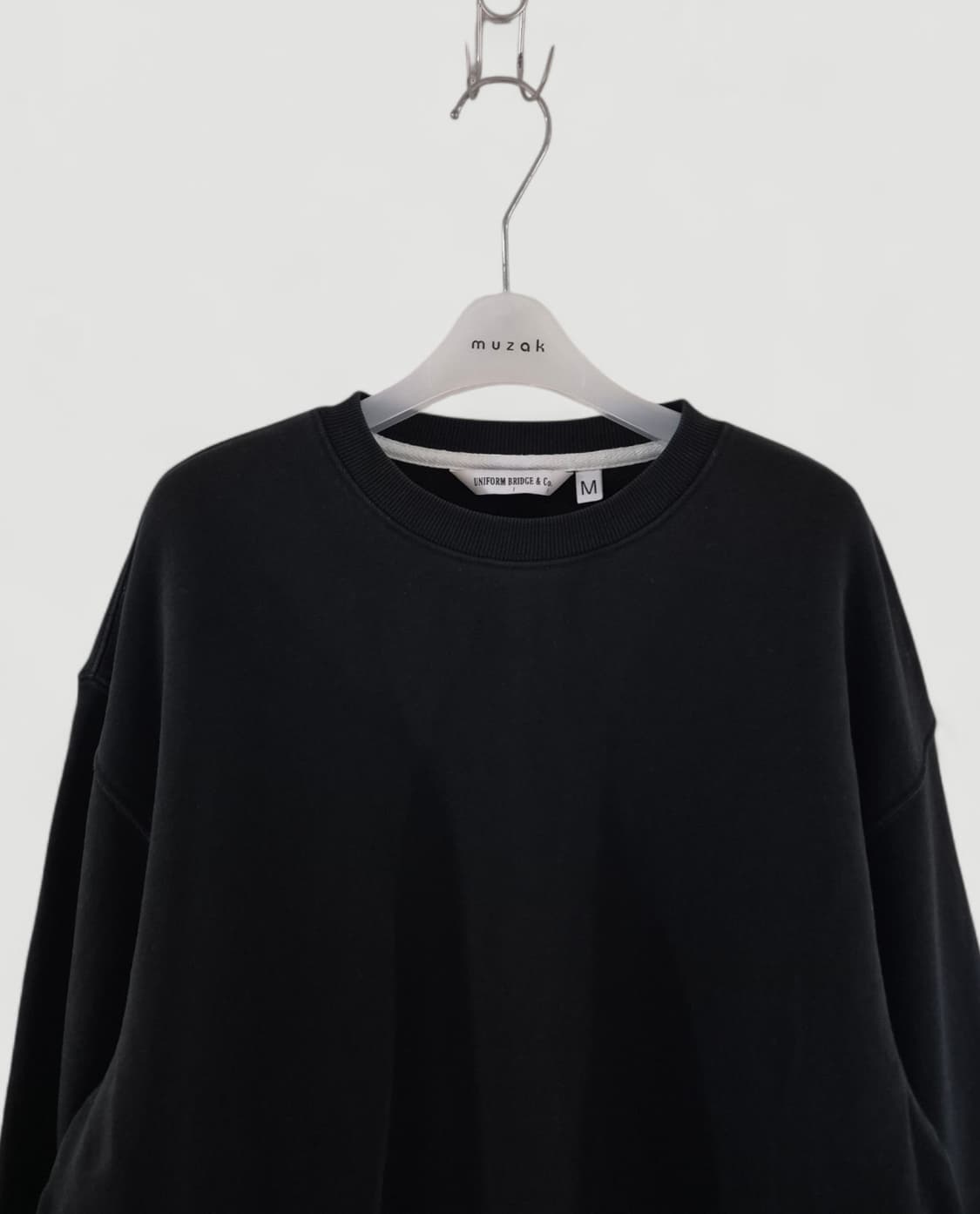 [100~105]유니폼브릿지 올블랙 스트링 맨투맨 오버핏 상품이미지1