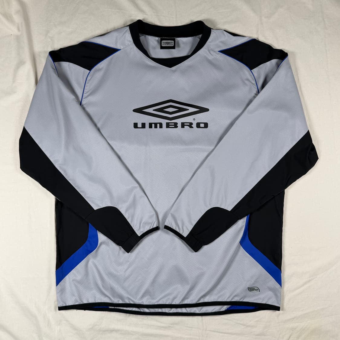 엄브로 바람막이 웜업 피스테 상품이미지1