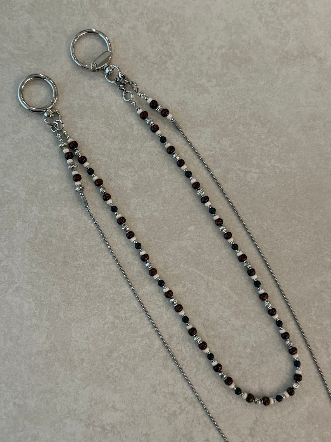 2중 레이어드 호두나무 포인트 바지체인 상품이미지1