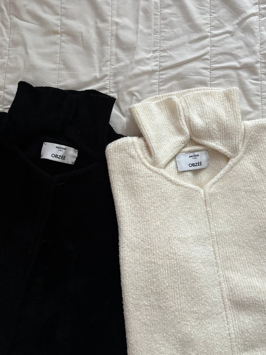 [OBZEE] 한섬오브제 터틀넥 홀 포인트 니트 상품이미지1