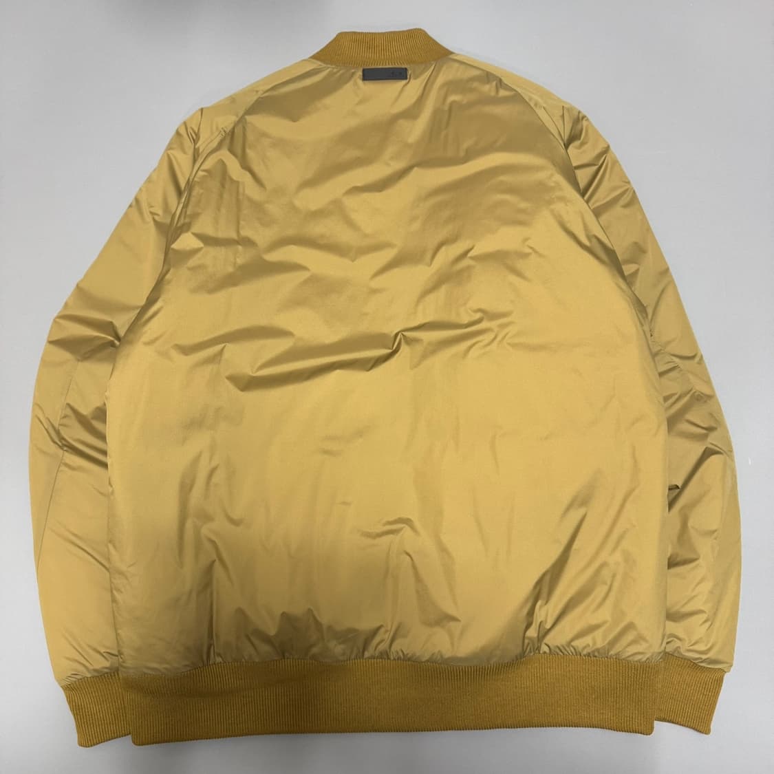 오클리(OAKLEY) 베이지컬러 서클로고 나일론 인슐레이션 블루종 자켓 상품이미지8