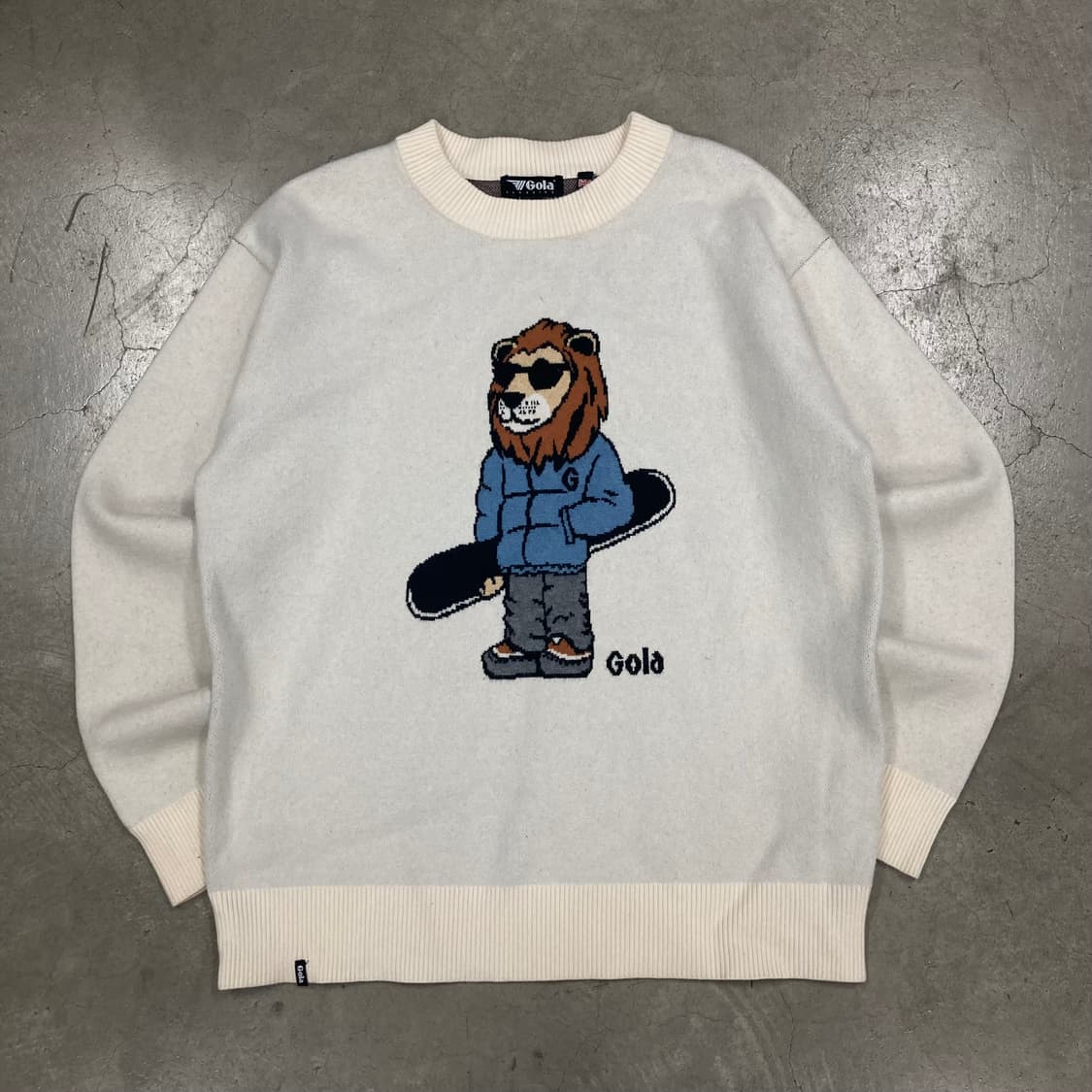 골라 아이보리 컬러 캐릭터 빅로고 니트 상품이미지1