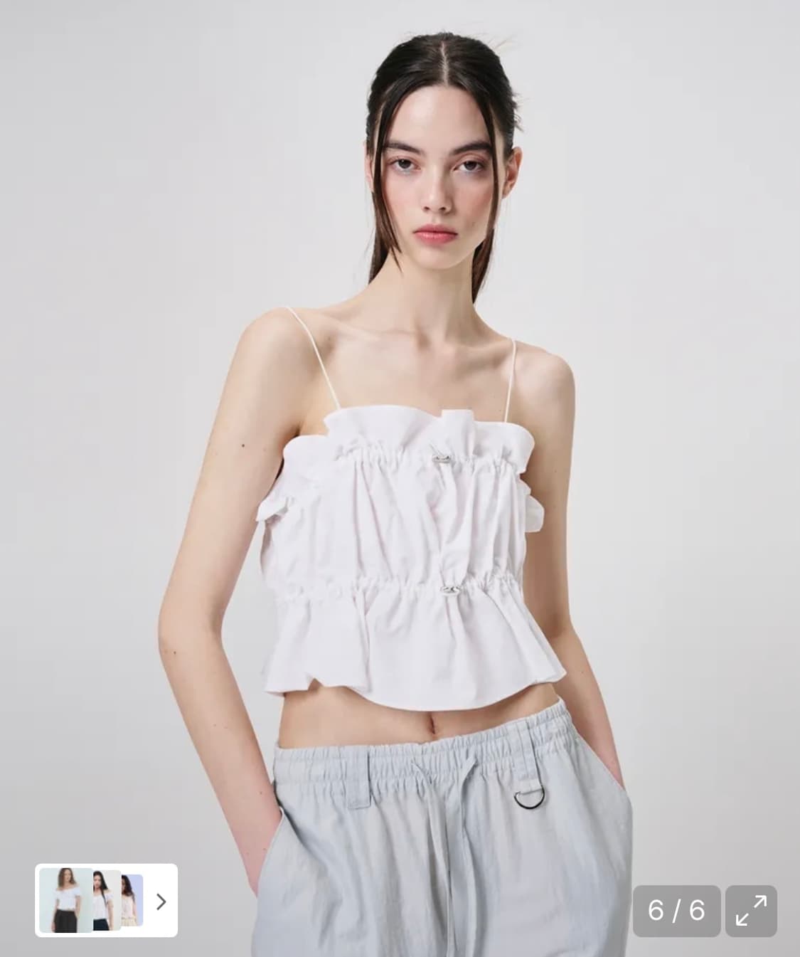 에트몽 화이트 링 스토퍼 슬리브리스 블라우스 상품이미지1