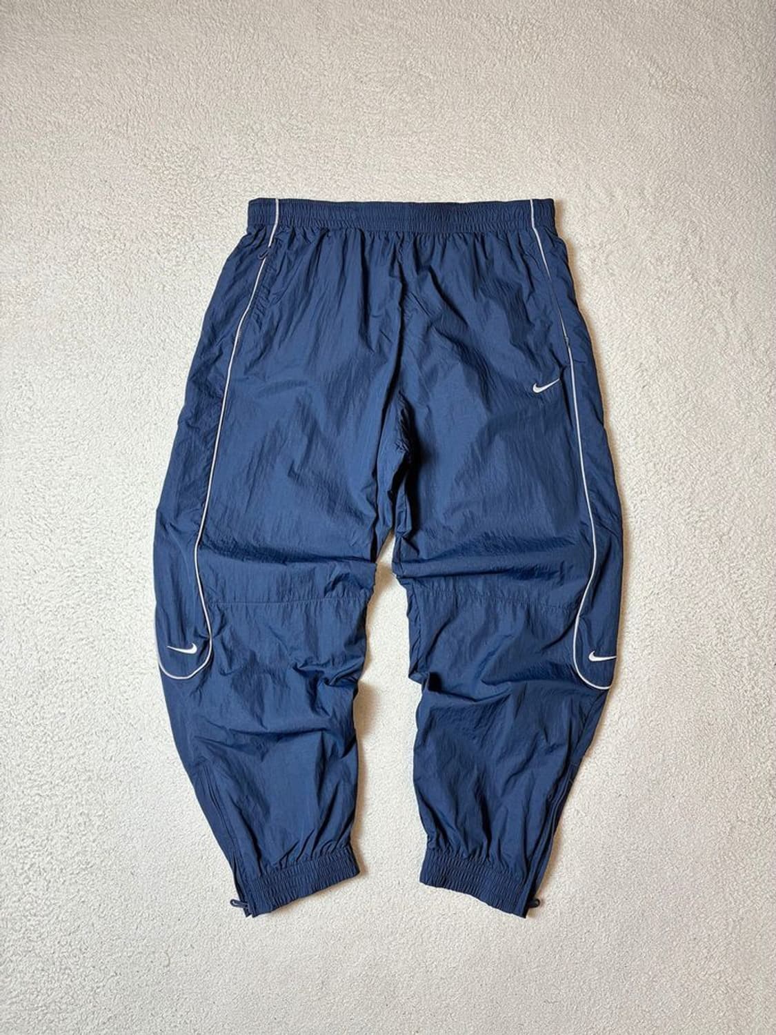 나이키 랩 24ss 솔로 스우시 우븐 트랙 팬츠 팬츠 PN7657 상품이미지1