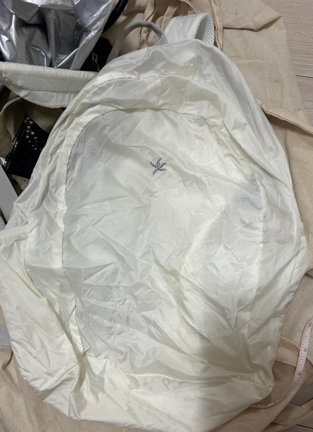 더콜디스트모먼트 패커블 백팩 상품이미지4