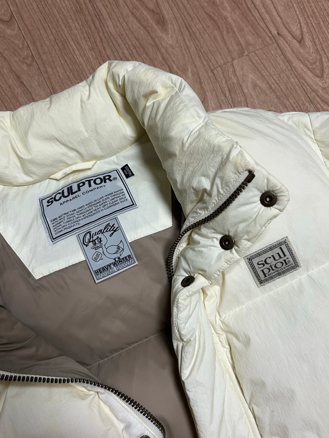 스컬프터 오버사이즈 푸퍼 다운(아이보리/L) 밀로우먼코이세이오디스커버리 상품이미지9