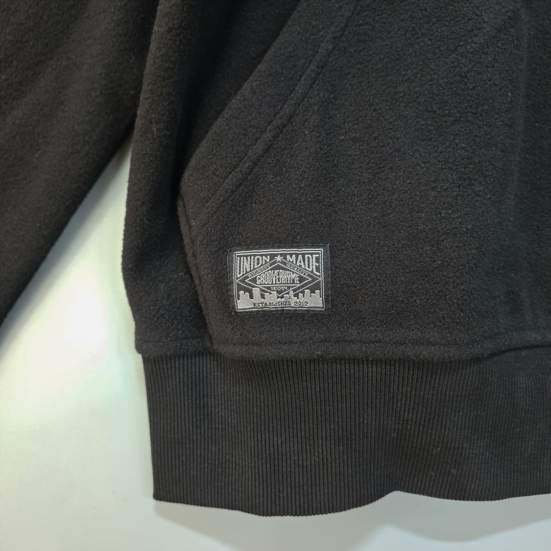 새제품)그루브라임(GROOVE RHYME) 하프집업 플리스 블랙 S 상품이미지3