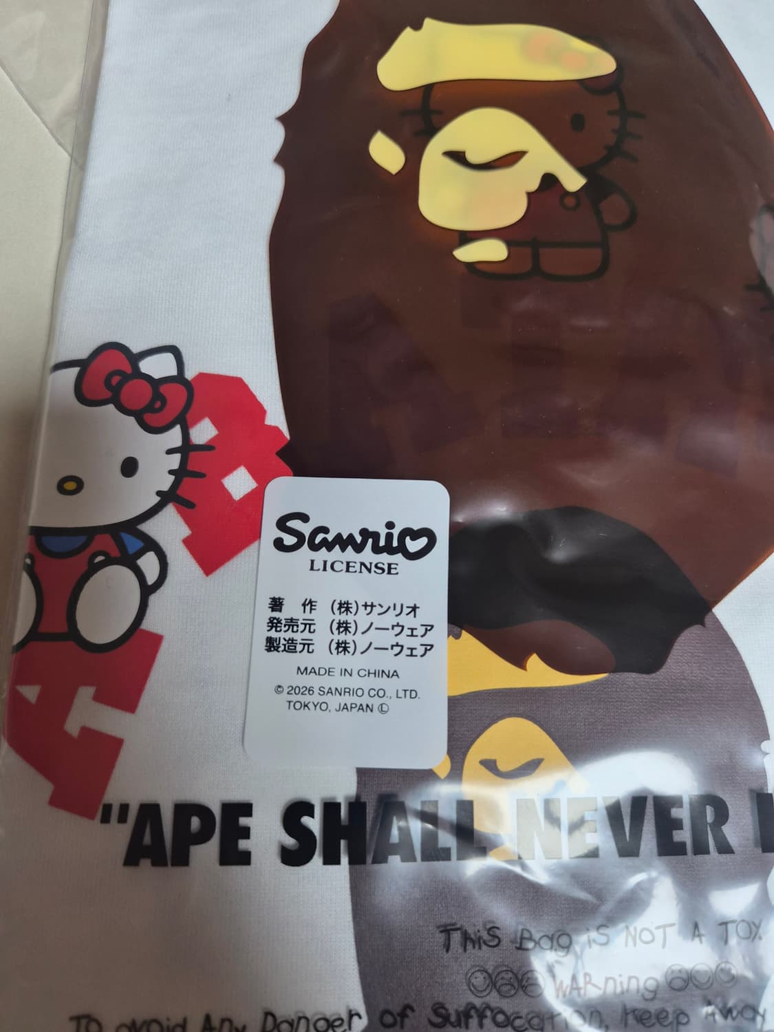 베이프정품 M 산리오 헬로키티 콜라보 컬리지 미니 티 상품이미지7