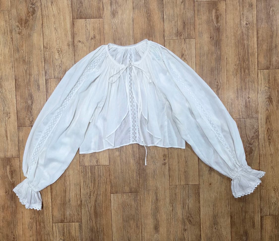 낸시렐라(nancyrella) 볼륨소매 가디건 프리사이즈 상품이미지1