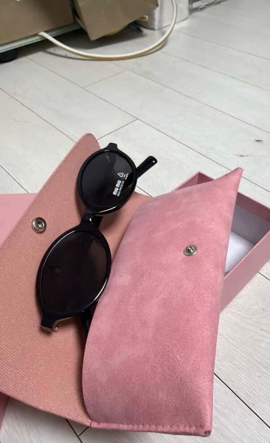 미우미우 선글라스 SMU04Z 상품이미지1