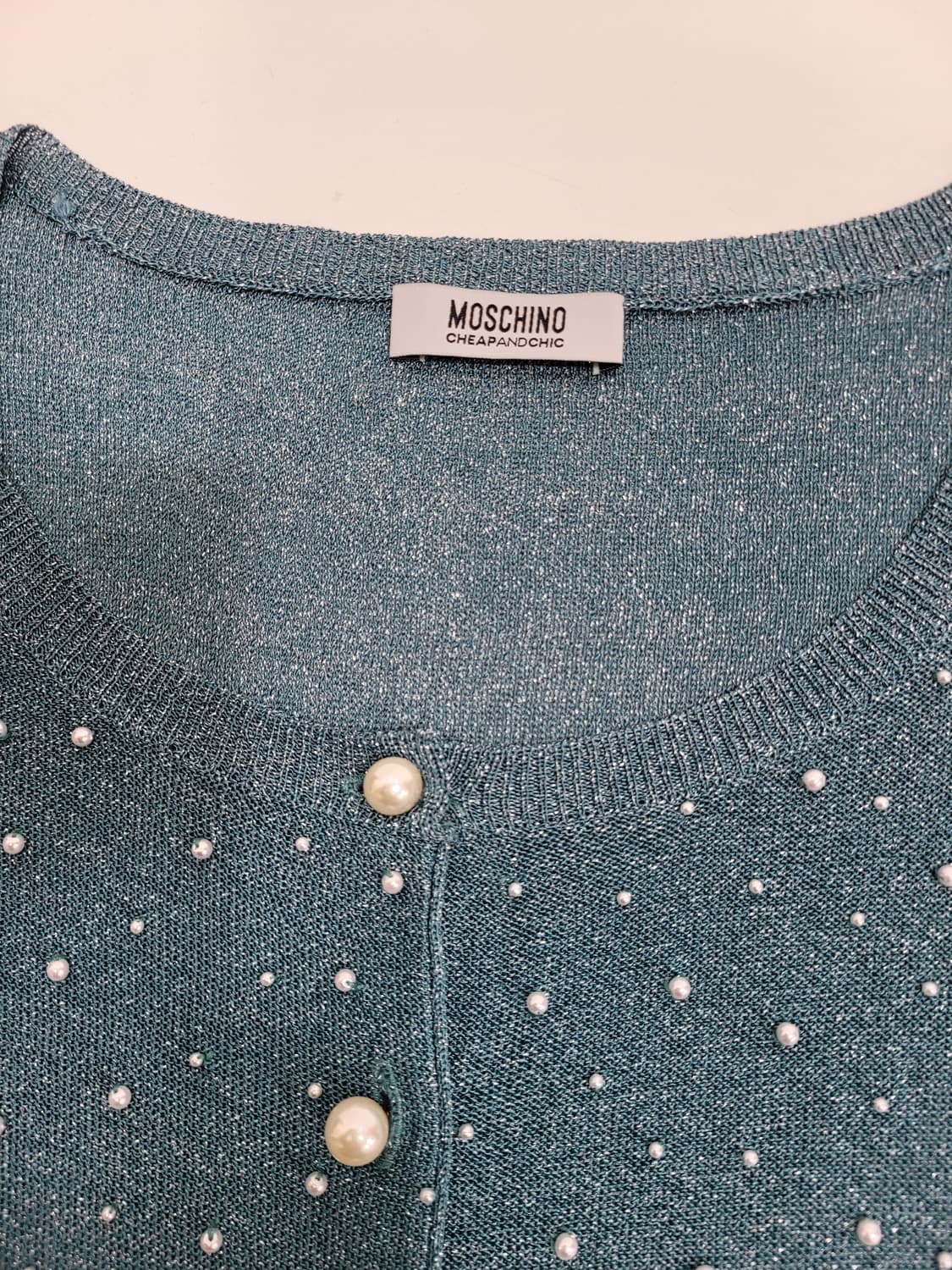 모스키노 칩앤시크 진주 장식 레이온 가디건 / 여 100 멜란지 블루
 상품이미지8