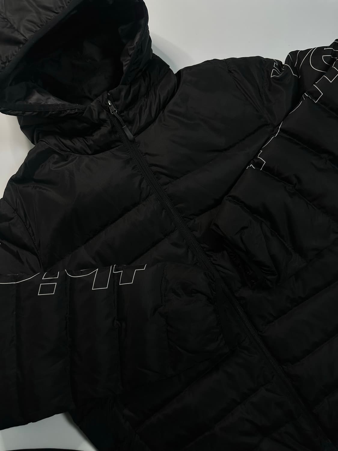 디스이즈네버댓 블랙 경량패딩 상품이미지1