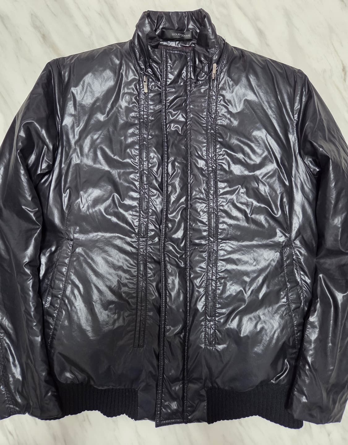 솔리드옴므 유광 지퍼디테일 다운패딩 상품이미지1