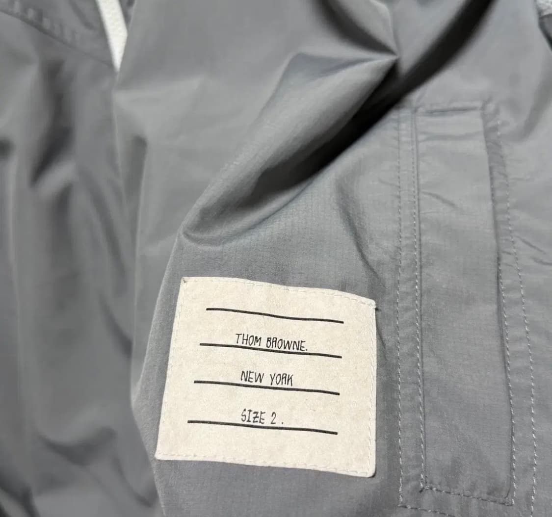 톰브라운 네이비 후드 사선 바람막이 2  상품이미지3