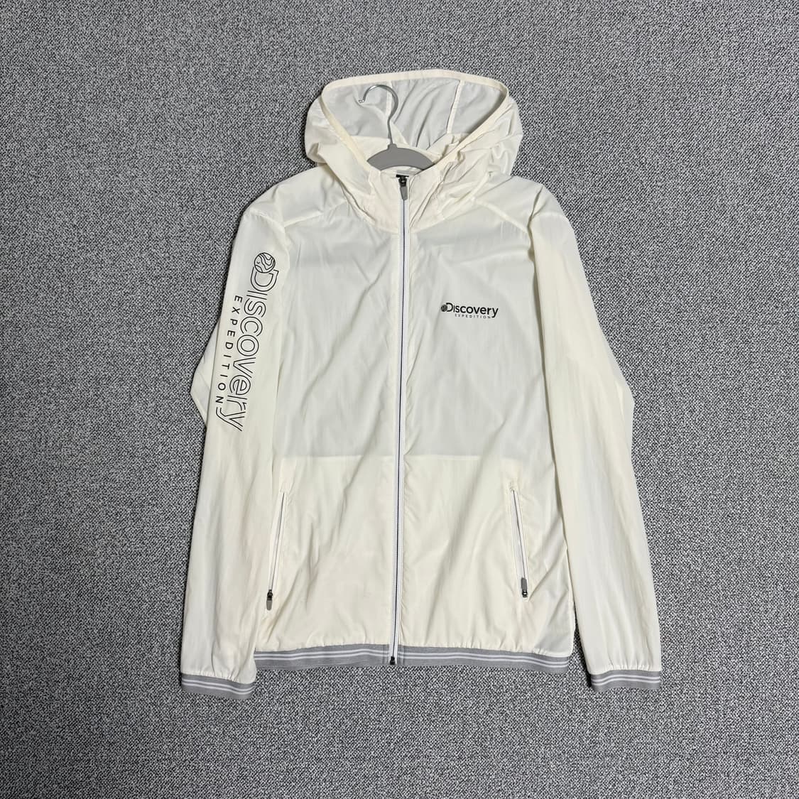 디스커버리 바람막이 아이보리 100 윈드브레이커 상품이미지1