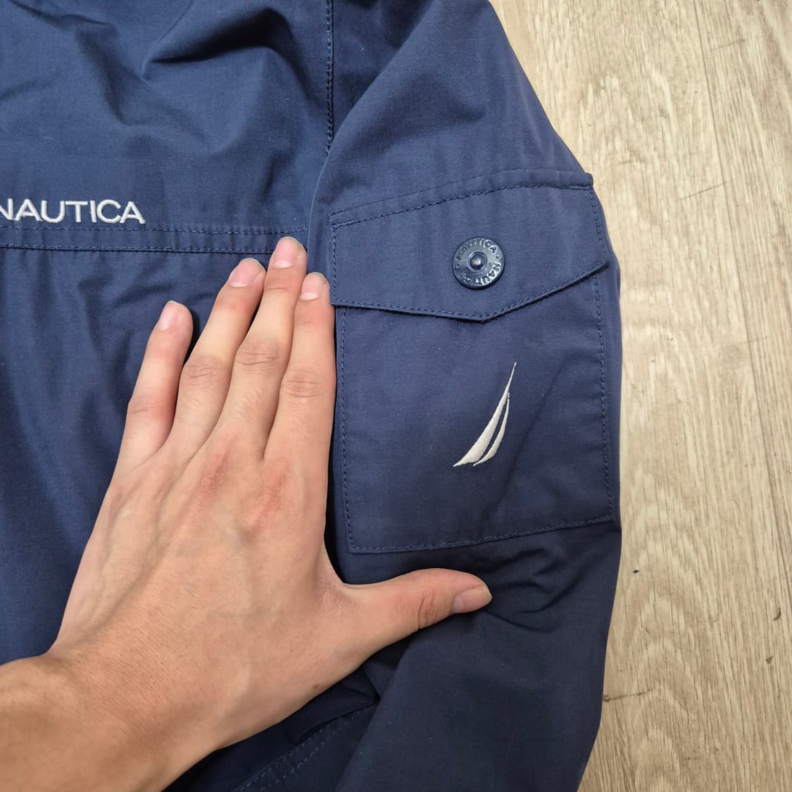 노티카 로고 네이비 바람막이 후드자켓 상품이미지4