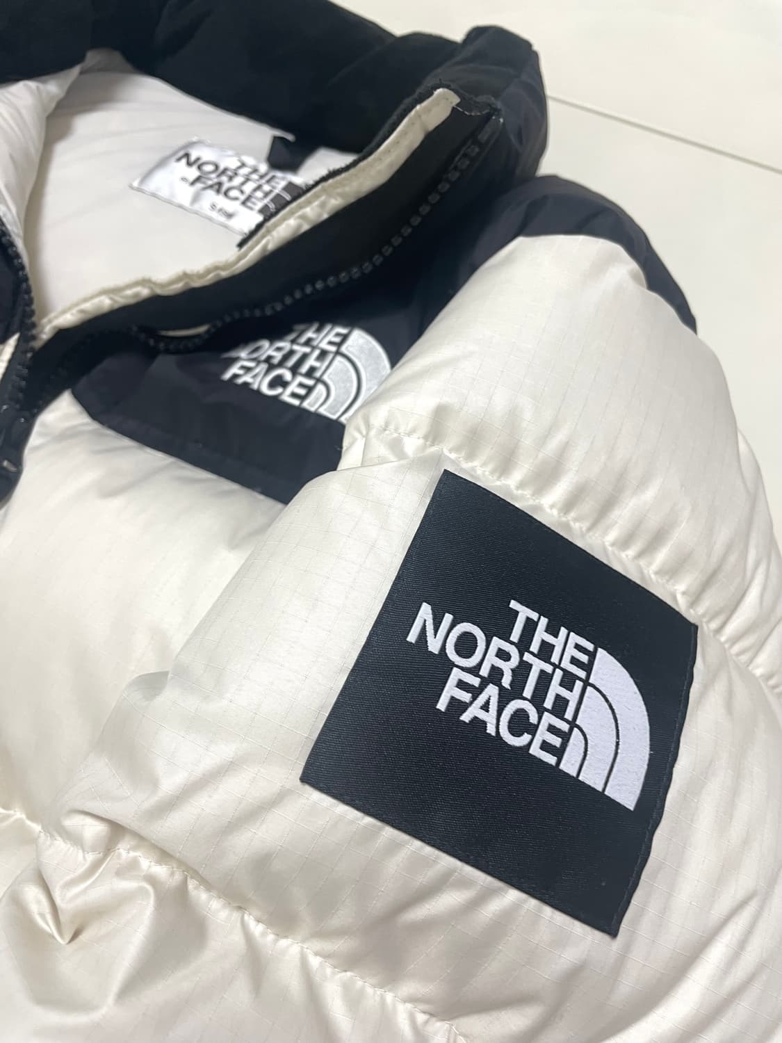 노스페이스 눕시 화이트라벨 노벨티 패딩 아이보리 S(90) 상품이미지3