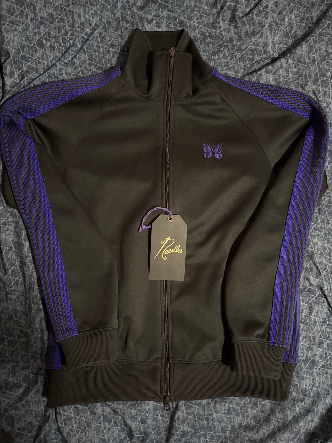 니들스 트랙자켓  검정보라 s 상품이미지1