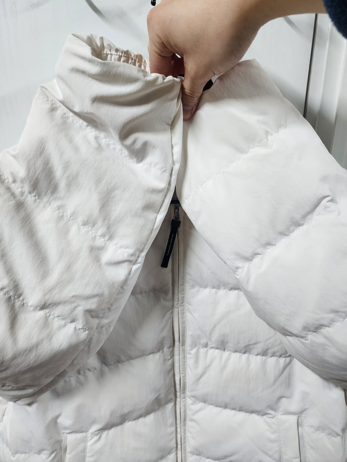 내셔널지오그래픽 여성 U넥 경량 패딩 아이보리 100 상품이미지4