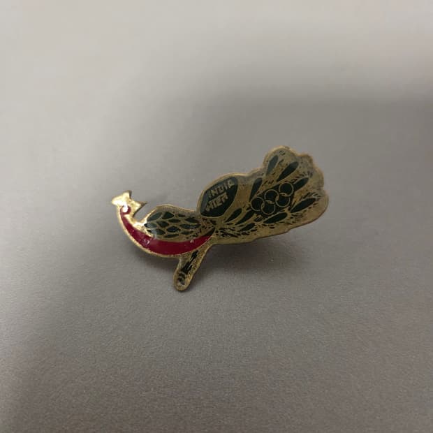 인도 올림픽 협회 공작새 뱃지