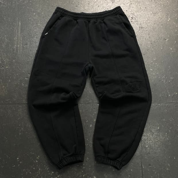 100 코닥 스웻팬츠 