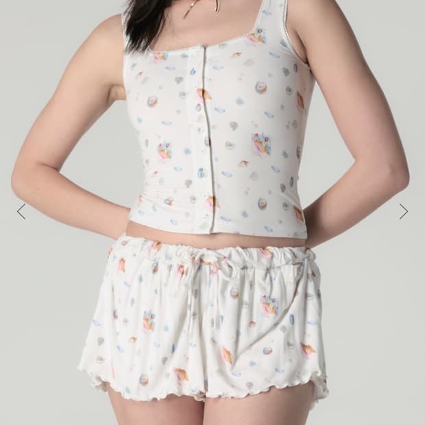 글로니 쇼츠 TWIRL FLARE SHORTS (IVORY SHELL)