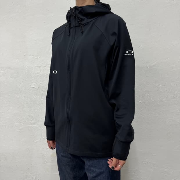 오클리(OAKLEY) 블랙컬러 인핸스 그리드 폴리에스터 후드 윈드브레이커