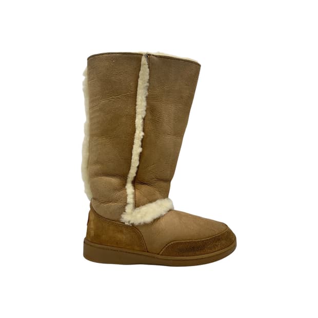 240 W 미네통카 부츠 (US7)