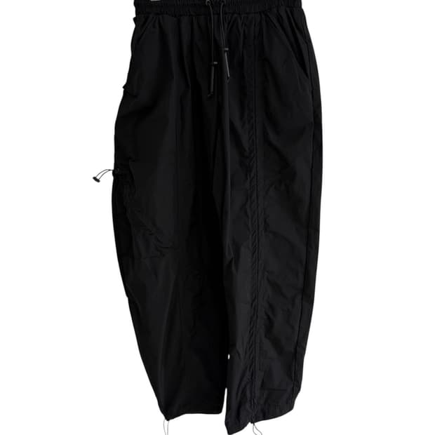 어 콜드 월 비대칭 셔링 조거 팬츠