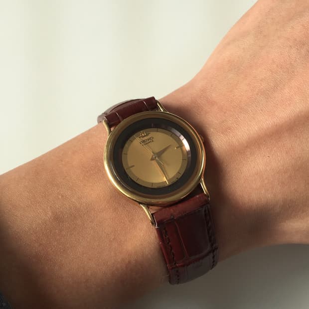 90s seiko gold-black combi quartz