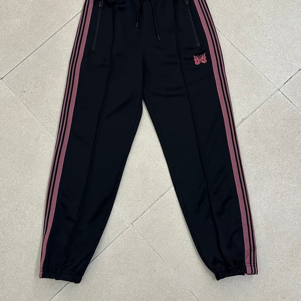 니들스 트랙팬츠