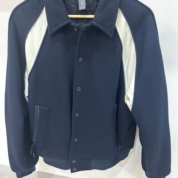 23FW 언어팩티드 바시티자켓