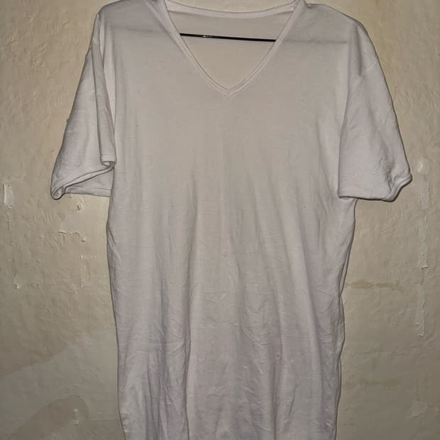 “Unknown” White V-neck T