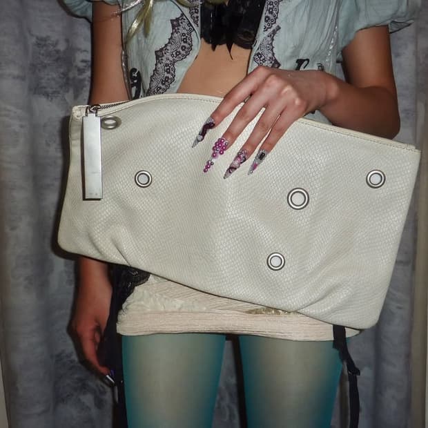 White eyelet clutchbag