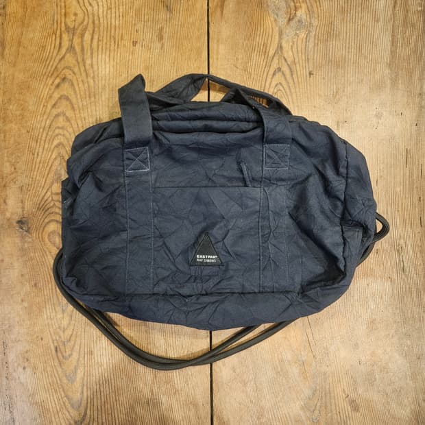 라프 시몬스 이스트백 크로스백