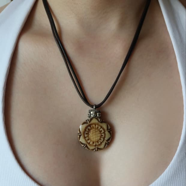 carved flower necklace