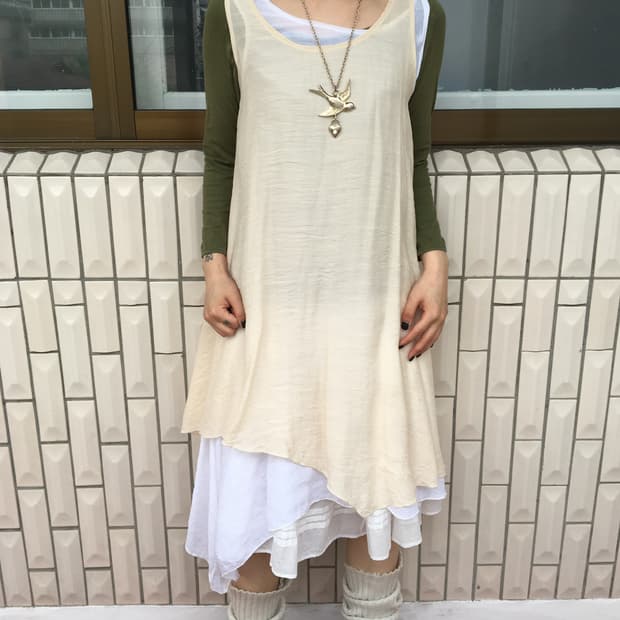 Layered point sleeveless unbalanced onep