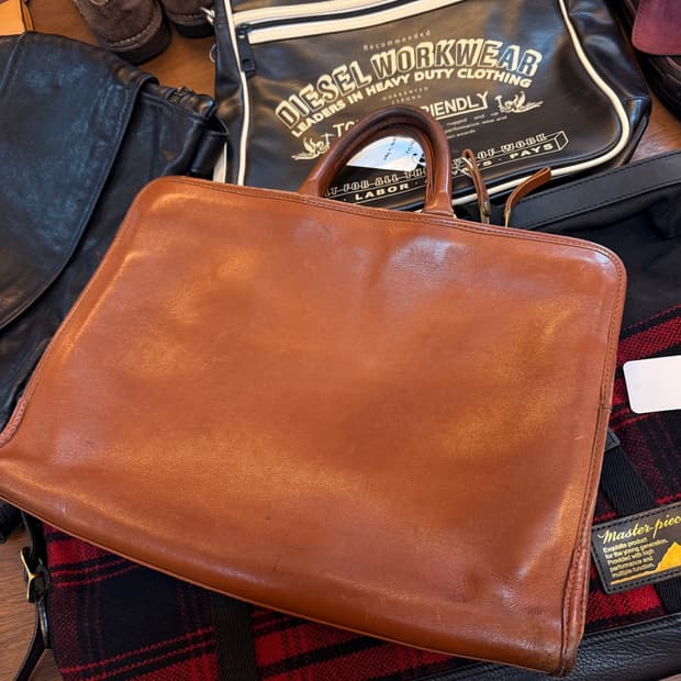 포터 레더 브리프케이스 파티나 현상 가방