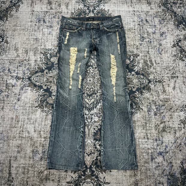 Kui damaged washing pants