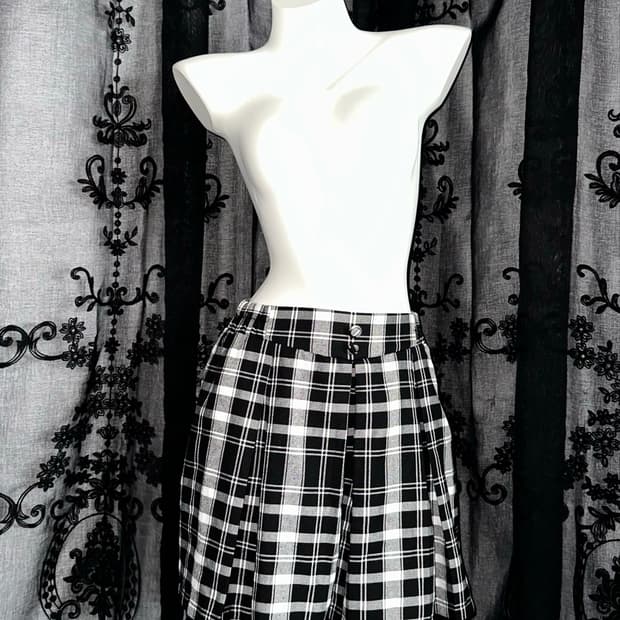 black checkered pleated skirt