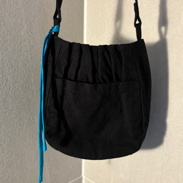 돌실나이 라미 크로스백