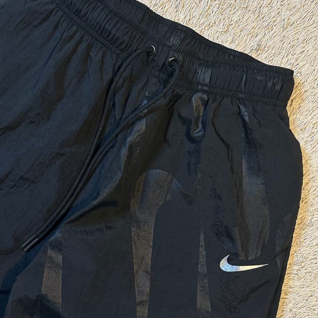 나이키 신형 스우시 미드라이즈 우븐 트랙팬츠 블랙